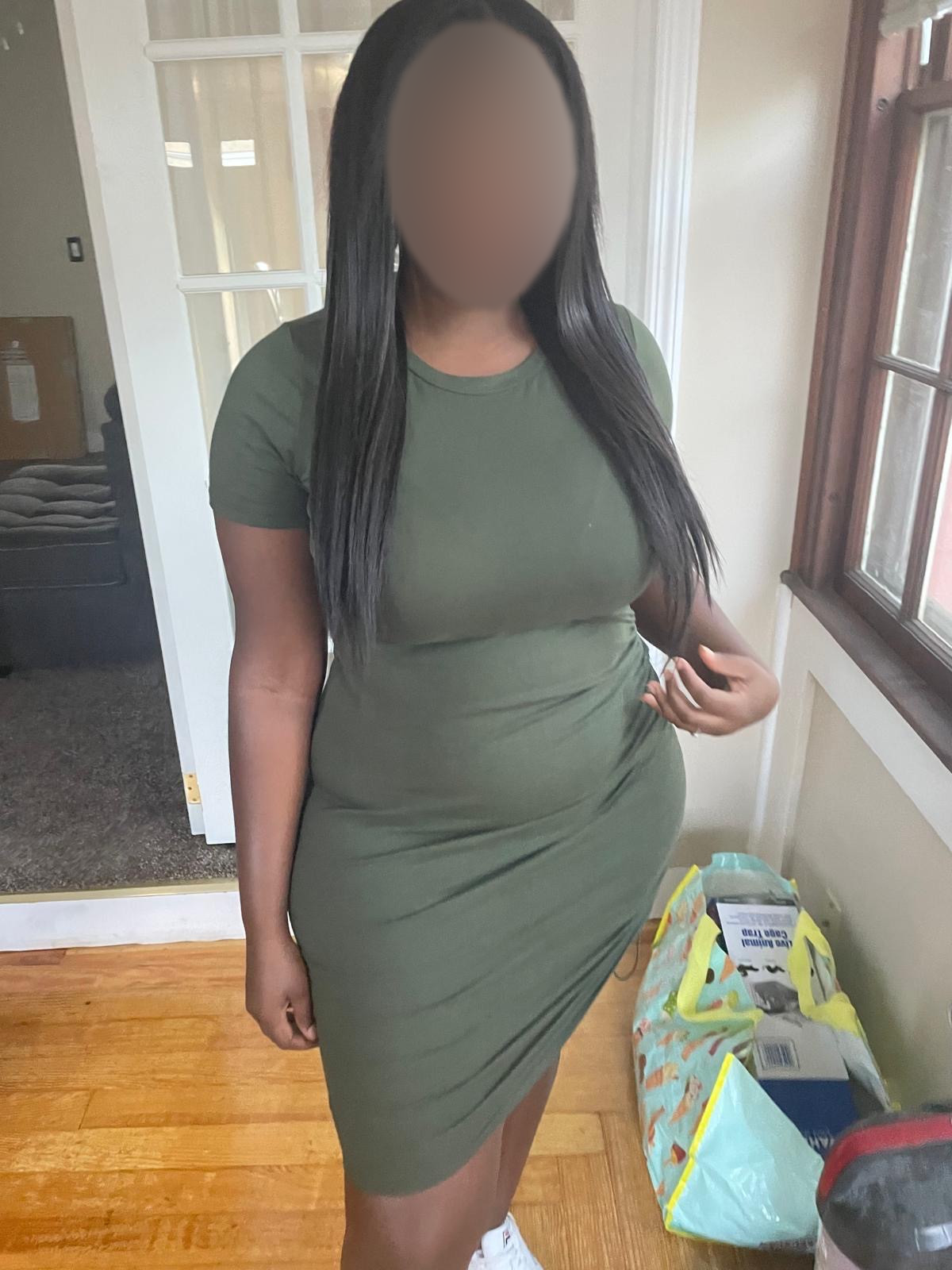 Before photo with the face blurred for privacy